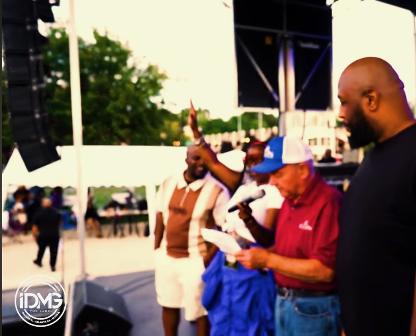 IDMG artists on stage with doves at LOTL